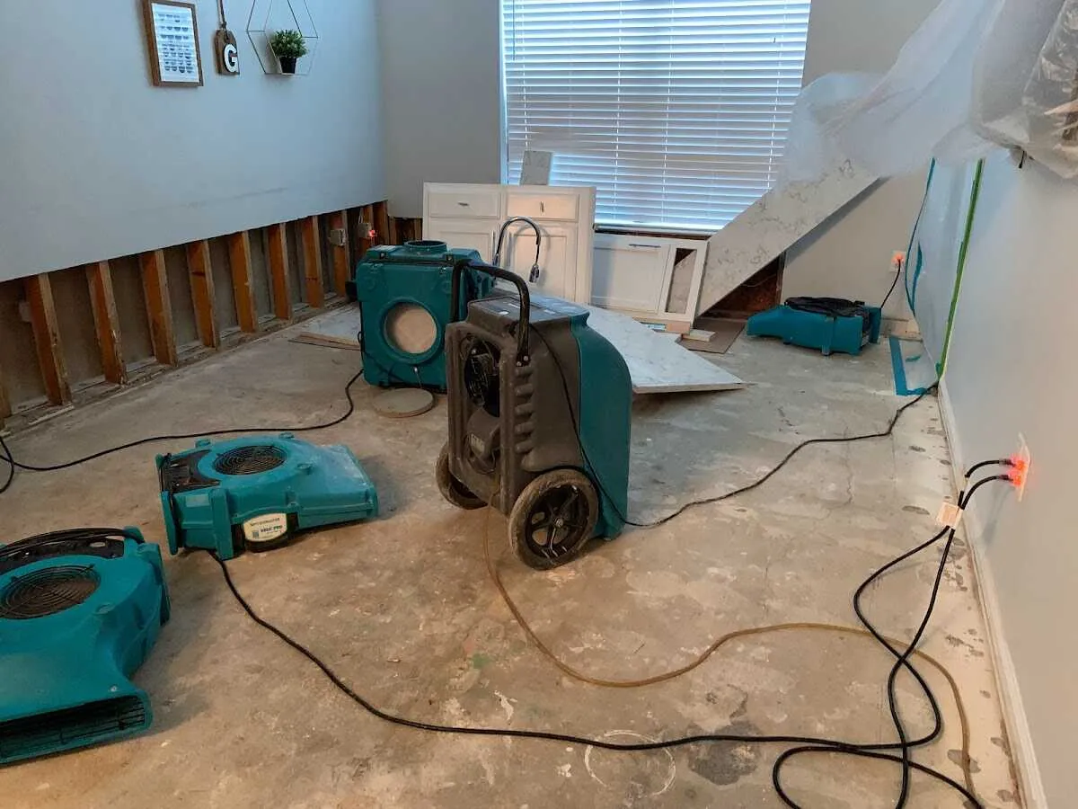 Dehumidifier in flood-cut room for Water Damage Restoration in Burke Centre